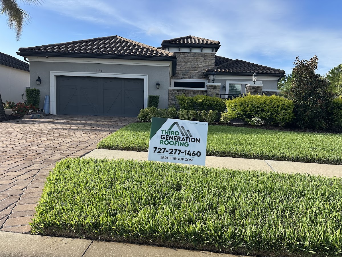 Third Generation Roofing yard sign outside a completed home